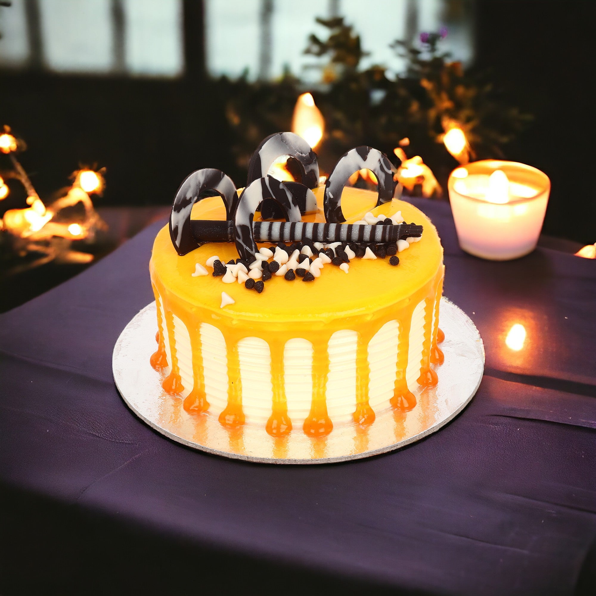 Yellow birthday cake decorated with balls in different colors and shapes  Stock Photo by wirestock